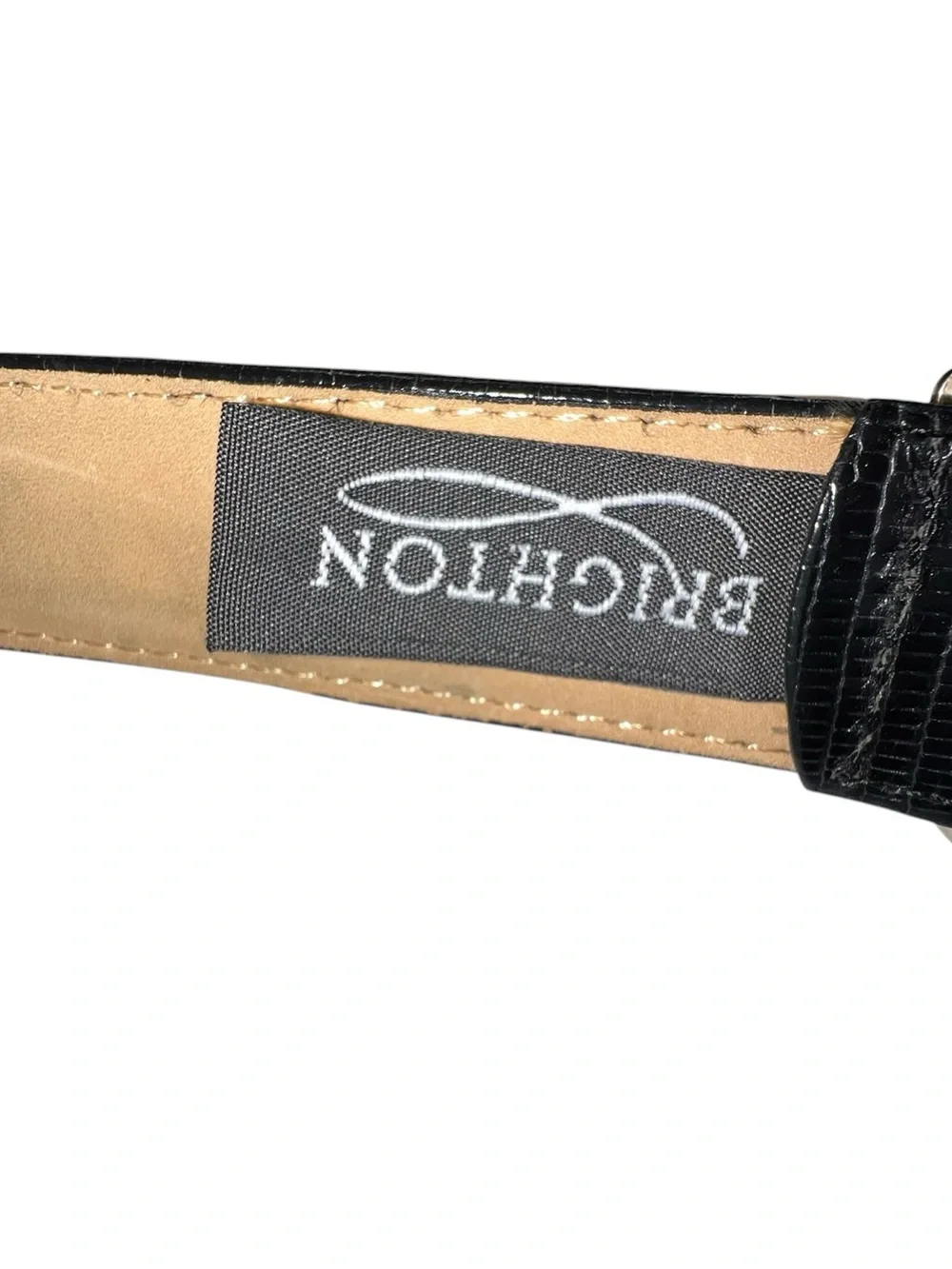 Brighton black snake skin style belt with intricate silver buckle.